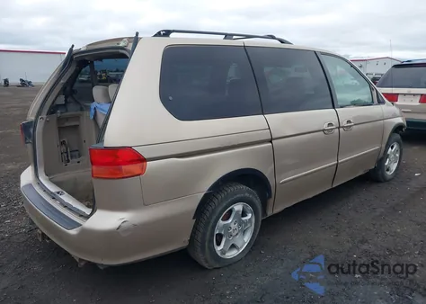 1999 Honda Odyssey Ex z USA, uszkodzony, nr VIN 2HKRL1864XH504660